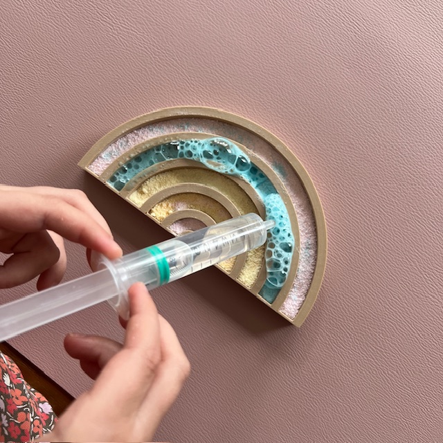 Sensorisch bruispoeder in regenboog PLA vulvorm